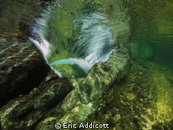 Looking downstream into the tongue of a small waterfall/r... by Eric Addicott 